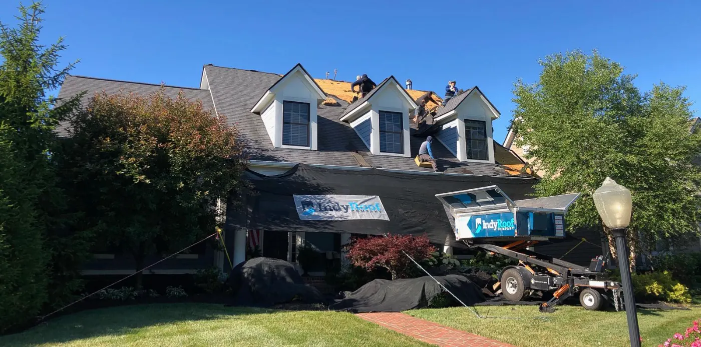 Emergency tarping on a Meridian Hills roof